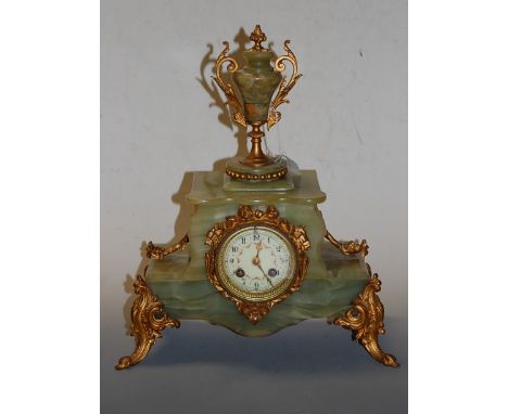 A 19th century onyx cased and gilt metal mounted mantel clock having painted enamel dial with Arabic numerals and eight day m