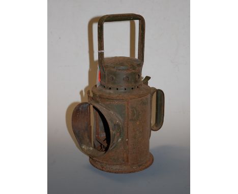 An early 20th century green painted railway hand lantern