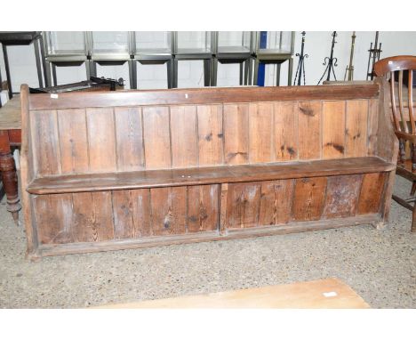 A pine church pew or bench