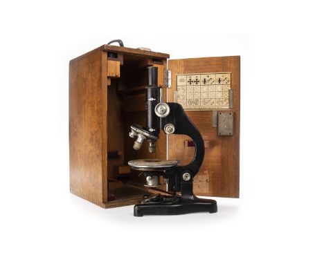EARLY 20TH CENTURY ERNST LEITZ WETZLAR MICROSCOPE, no. 335948, with three subjective lenses, black lacquered body, contained 