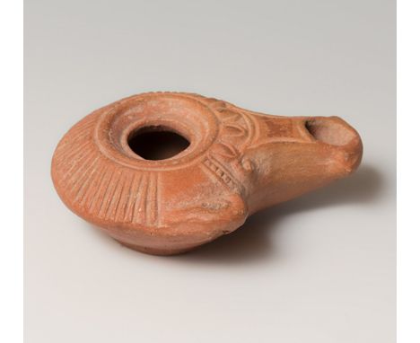 Lucerne from Egypt. Greek culture, 3rd-2nd century BC.Terracotta.Provenance: private collection, Bordeaux.In good state of pr