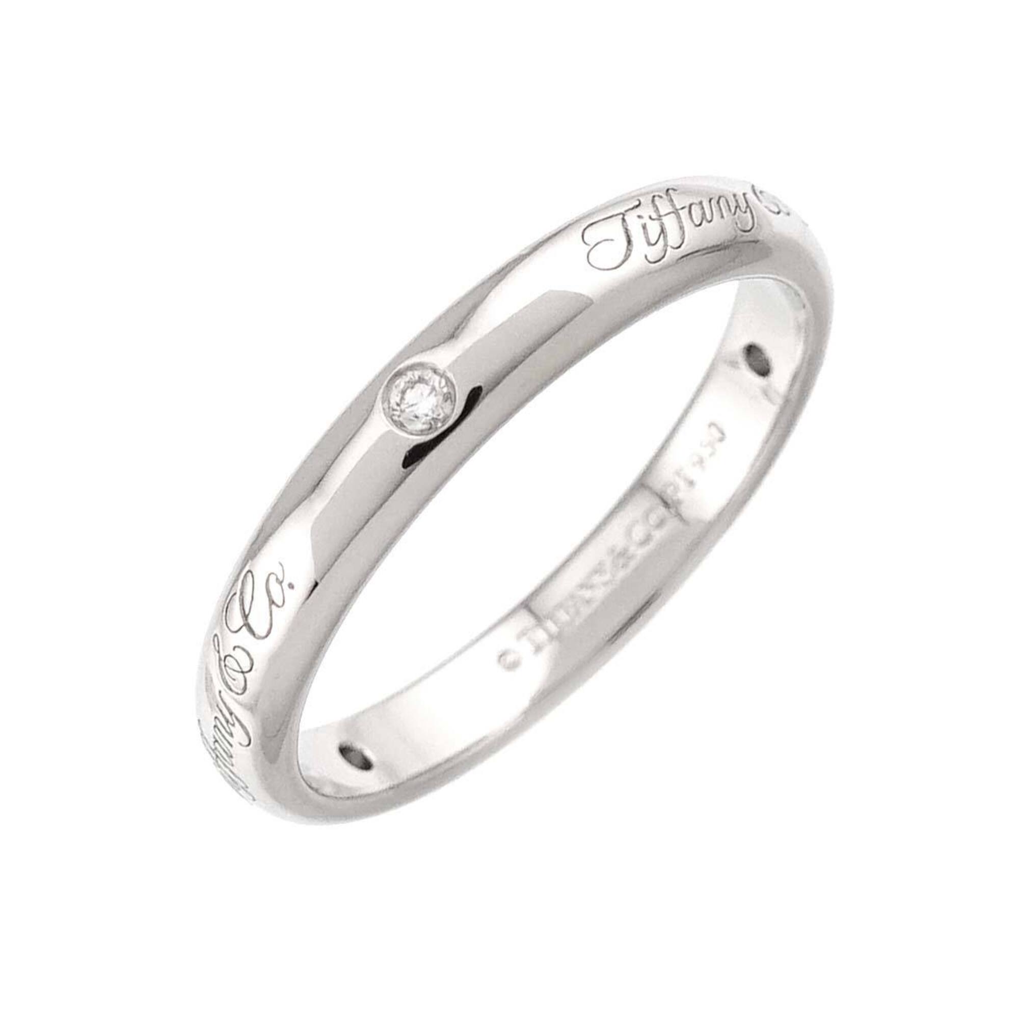 Tiffany & Co. Lucida Notes Ring, 3 Diamonds, Platinum.
