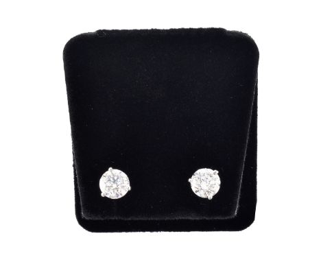 Approx. 2.02 Carat Round Brilliant Cut Diamond and 14 Karat White Gold Ear Studs. Diamonds H color, SI3 clarity. Stamped 14K.