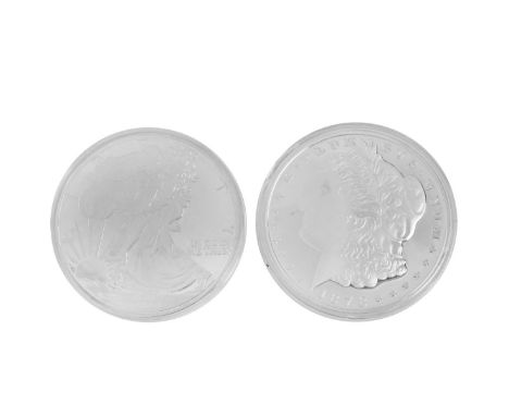 Two (2) one pound .999 Silver Rounds. In plastic cases. Total weight approx. 24 troy ounces or 746.483 grams. Condition: Good