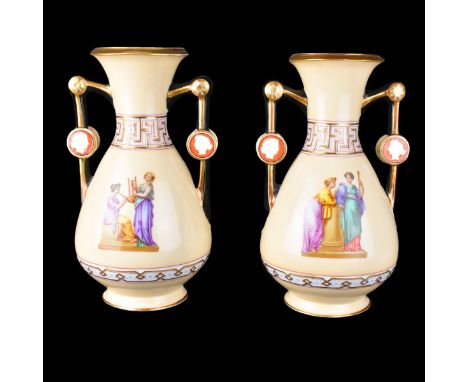 Pair of Old Paris porcelain urns. Classical figural motif. Unsigned. Measures 13" H. Condition: Light rubbing to edges or in 