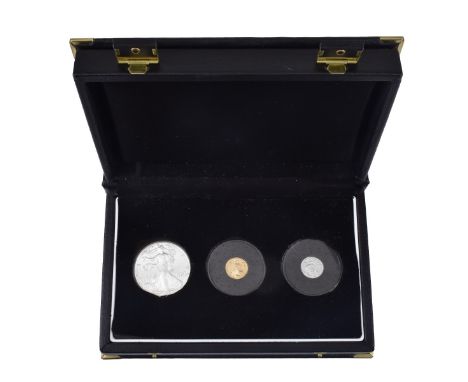 1998 Platinum, Gold, Silver Eagle U.S. Coin Set With Case. Includes: 1 oz. Silver Dollar , 1/10 oz. Gold $5.00 Coin, 1/10 oz.