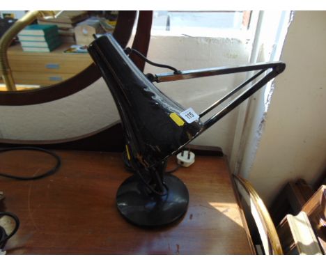 A black angle poise lamp