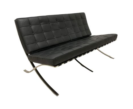 After Ludwig Mies Van De Rohe - 'Barcelona' two seat sofa settee upholstered in buttoned black leatherDimensions: Height:&nbs