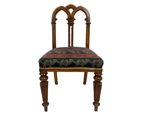 19th century Gothic Revival oak hall chair, pierced and carved back of Gothic tracery design with moulded uprights, seat upho