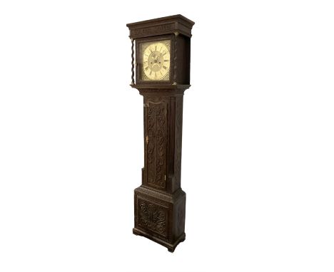 8-day - profusely carved oak longcase, with a flat top and square hood door beneath, door flanked by barley twist columns wit