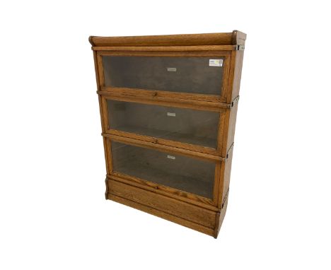 Globe Wernicke - early 20th century light oak three-tier stacking library bookcase, fitted with three graduating book shelves