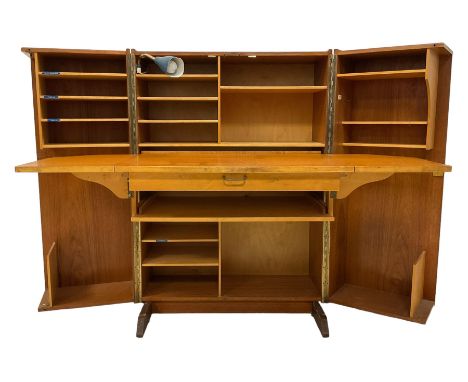 Mummenthaler & Meier - mid-20th century teak metamorphic 'Magic Box' desk, the two door open to reveal desk, document divisio