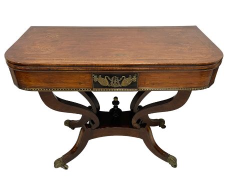 Regency inlaid rosewood card table, rectangular swivel and fold-over top with rounded corners and baize lined interior, the f