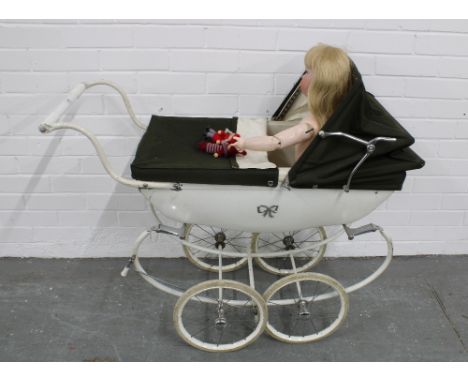 Child's vintage Silver Cross pram and a bisque head doll, 67cm long, etc (2)