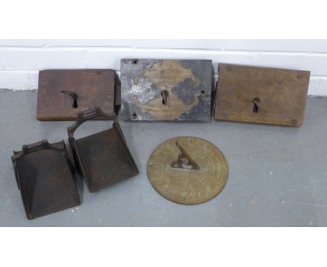 Three antique lock plates and keys, a pair fo iron horse stirrups and a brass sundial (5) 