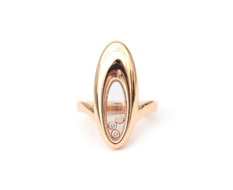 An 18 karat gold diamond Chopard ring. Ref. 6307053 / 827781-5210. Elongated oval model with three 'floating diamonds'. Gross