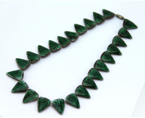 An Alice Lund, Denmark ceramic necklace, 1950's, designed as a fringe of triangular panels each glazed in green, impressed 'A