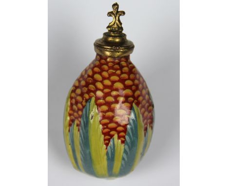 A late 19th century novelty Italian enamel scent bottle, modelled as a pineapple, lacking chain and stopper seized, 6.5cm