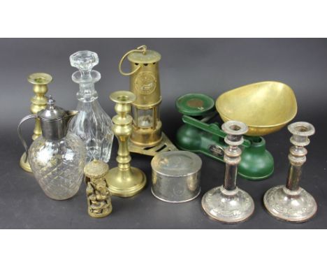 A Victorian silver plated oval tea caddy, by Elkington & Co, a pair of candlesticks, a claret jug, a decanter and stopper and