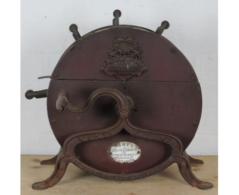 A Kents Patent Knife Cleaner with improvements Patented 1865-1870, with metal armorial plaque and enamel badge, iron stand ca