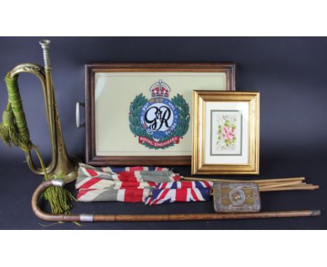 A collection of World War One and later memorabilia; comprising a brass bugle; a 1914 Christmas tin with miniature pair; seve
