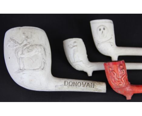 A 19th century clay pipe decorated with jockey Fred Archer and his horse Donovan; another of boxers Sillivan and Smith; anoth