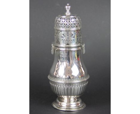 A large silver sugar caster, Chester 1926, probably S. Blanckensee & Sons Ltd (makers mark rubbed) of stop fluted design with