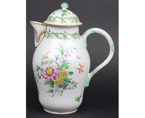 An 18th century Bristol hard paste porcelain coffee pot and cover, flower head finial on a domed lid, ogee shaped body with m