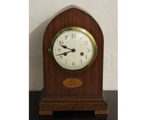 An Edwardian mahogany lancet shaped mantel clock, with enamel Arabic dial and eight day movement striking on a gong, 38cm