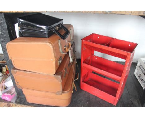 A red enamelled vintage 'Tala' vegetable rack along with three suitcases containing a quantity of vintage kitchenalia, an Ilf