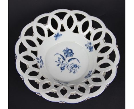 A Worcester chestnut basket circa 1775, the circular basket with pierced rim printed in blue to the centre with the Gilliflow