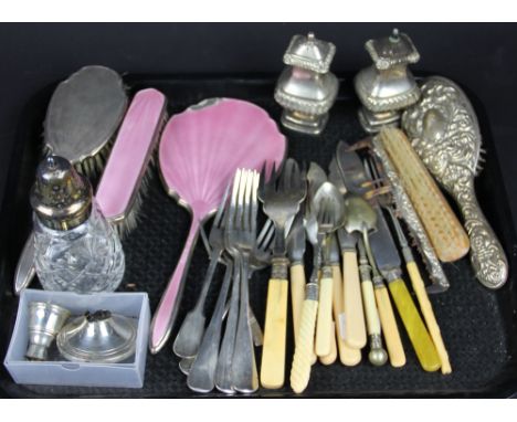 A silver backed hair brush, comb and further brush, along with dressing table brushes, a silver candlestick (at fault), a sug