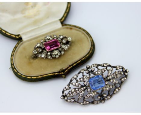 A Victorian pink and colourless paste set brooch, designed as a central pink stone within floral colourless paste set surroun