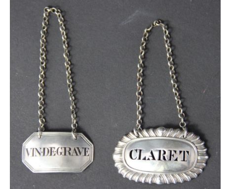 A silver 'Vin De Grave' decanter label decanter label, 'J.A' London 1814, of canted rectangular form, reeded rims and black e