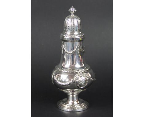 A large German silver caster, imported by Berthold Muller and assayed for Chester 1899, the large baluster caster decorated w