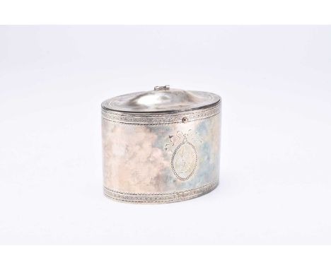 A George III silver tea caddy, William Vincent, London 1795, of oval form with bright cut engraved decoration and crest withi