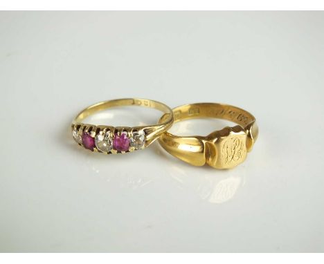 An early 20th century graduated five stone ruby and diamond ring, stamped '18ct', size G 1/2, together with an early 20th cen