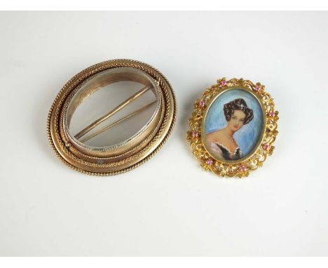 A miniature mother of pearl portrait brooch, the yellow metal mount set with faceted rubies, stamped '750', weight approx 10g