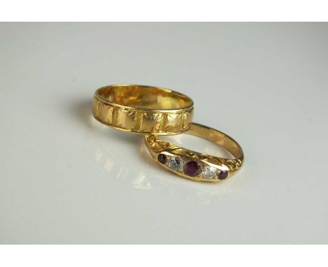 A Victorian 18ct gold decorative band, hallmarked Birmingham 1878, ring size M, together with a five stone graduated ruby and