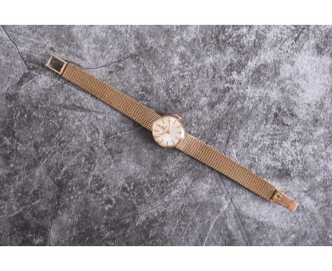 Omega: A lady's 9ct gold bracelet watch Reference: 660.178 Date: 1954 Movement: Cal.244 17-jewel manual wind Dial: Sunburst s
