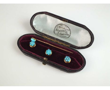 A set of three turquoise studs, each mounted in yellow metal and presented within case, together with a turquoise set stick p