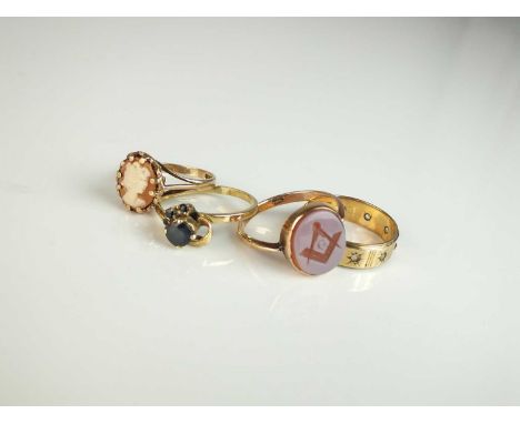 A yellow metal hardstone signet ring, with Masonic intaglio, the yellow metal shank stamped '9ct', ring size P 1/2, together 