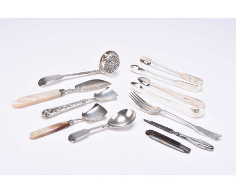 A small collection of silver, comprising; two pairs of silver sugar tongs, a silver sugar sifter spoon, a silver caddy spoon,