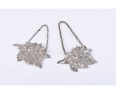 Two silver decanter labels, each of stylised leaf form, comprising 'Port' by Charles Rawlings &amp; William Summers, London 1