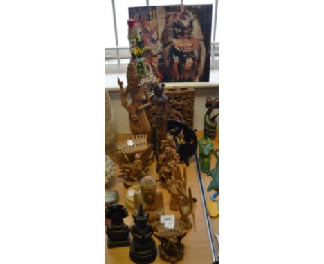 Carved softwood deities, various; a rama puppet