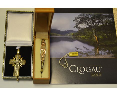 A Russian silver cross; a Clogau (Welsh) silver and gold bangle, with certificate; 25g (2)