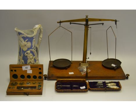 A set of brass balance scales and weights; a Moroccan leather cased necessaire, mother of pearl handles; etc.