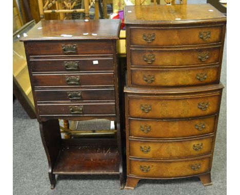 An Edwardian mahogany stained music cabinet c.1910; an early 20th Century burr walnut chest on chest of three long cockbeaded