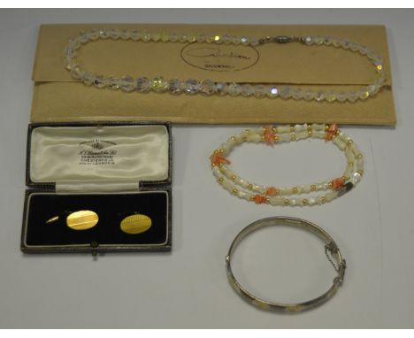 Jewellery - a silver bangle; 9ct gold cufflinks; coral necklace;  etc (4)