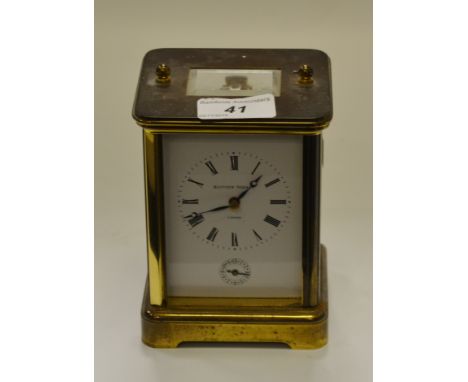 A 20th Century brass carriage clock, retailed by Matthew Norman